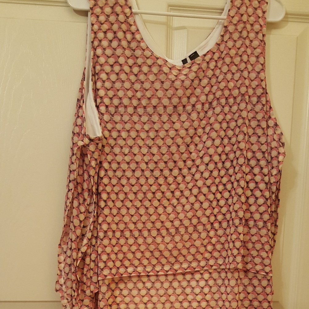 Long lined sleeveless tunic
